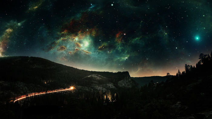 Night landscape with stars and nebula over mountains
