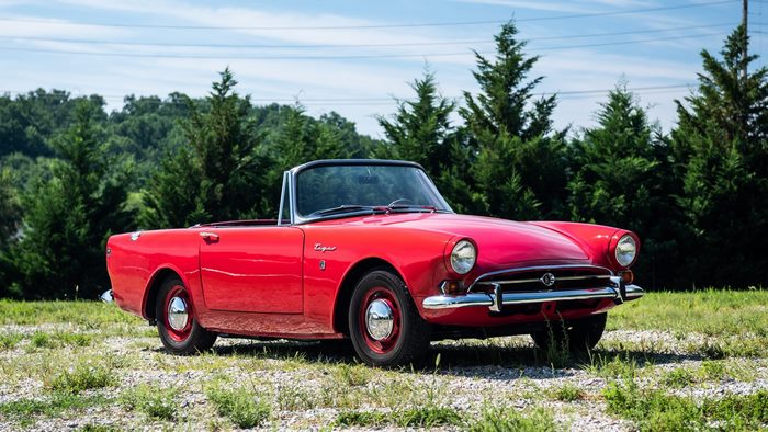 Red 1965 Sunbeam Tiger Convertible parked outdoors