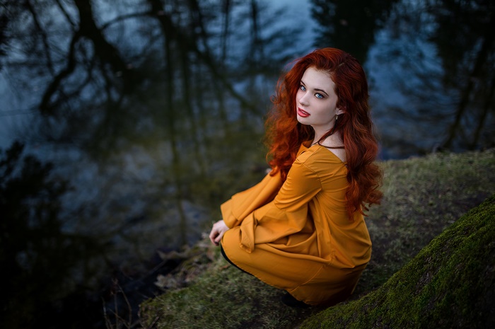 Redhead Woman with Blue Eyes and Long Hair