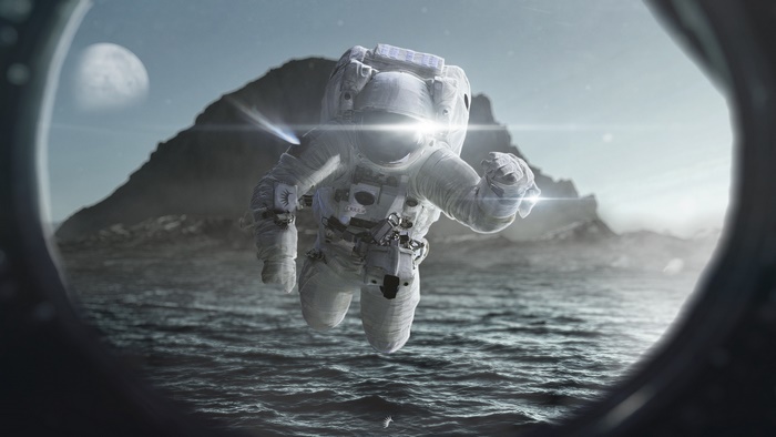 Astronaut floating over ocean near island