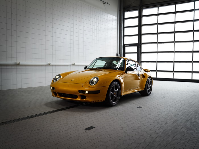 Yellow Porsche 911 Turbo in a Garage