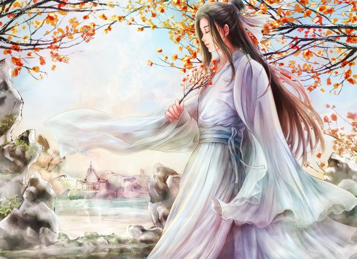 Man in white robes under autumn trees