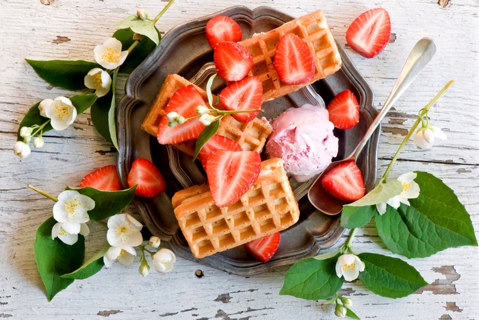 Waffles with strawberries and ice cream