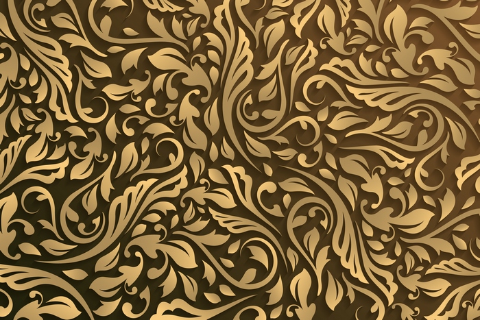 Golden floral pattern on a dark background