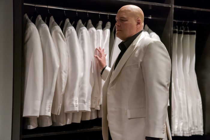 Wilson Fisk in a closet of white suits