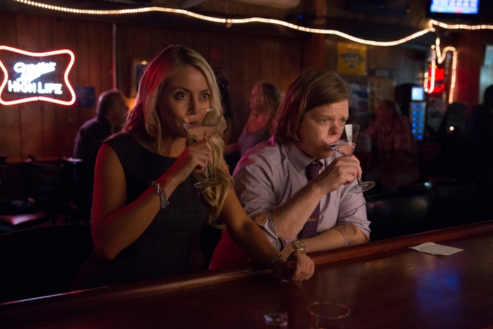 Elden Henson and woman drinking at a bar