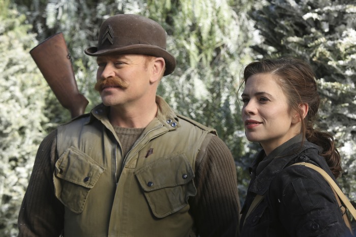 Peggy Carter and Jack Thompson with a rifle