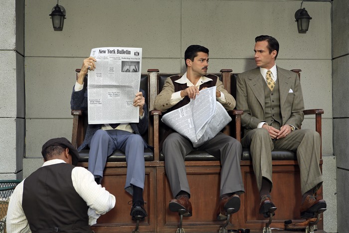 Howard Stark and Edwin Jarvis reading newspapers