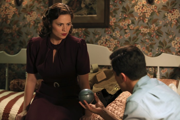 Peggy Carter and Howard Stark with a mysterious orb