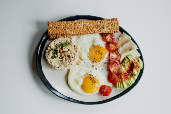 Breakfast with eggs, avocado, and toast 4K