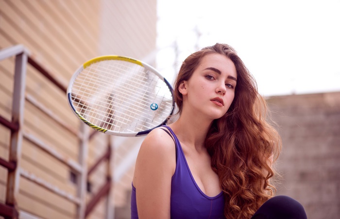 Woman with a tennis racket