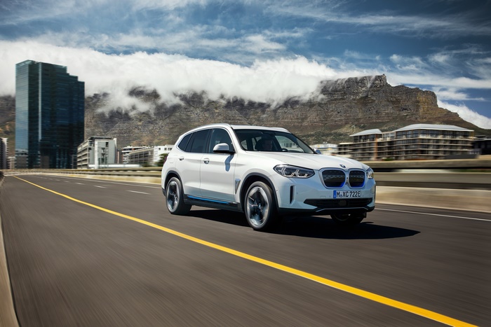 White BMW iX3 Electric SUV on a Road