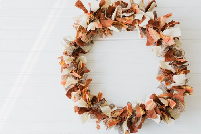 Rustic Autumn Fabric Wreath on White Wood Wall