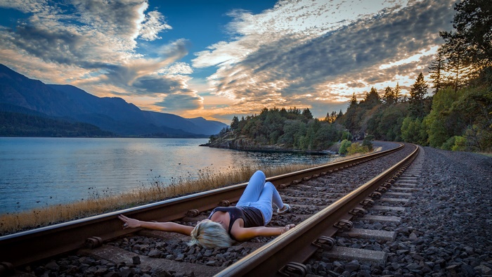 Model Relaxing on Railroad Tracks by Lake 4K