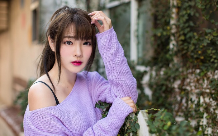 Brunette Asian Woman in Lilac Sweater