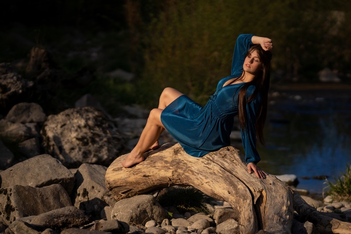 Brunette Woman in Blue Dress with 4K Depth of Field