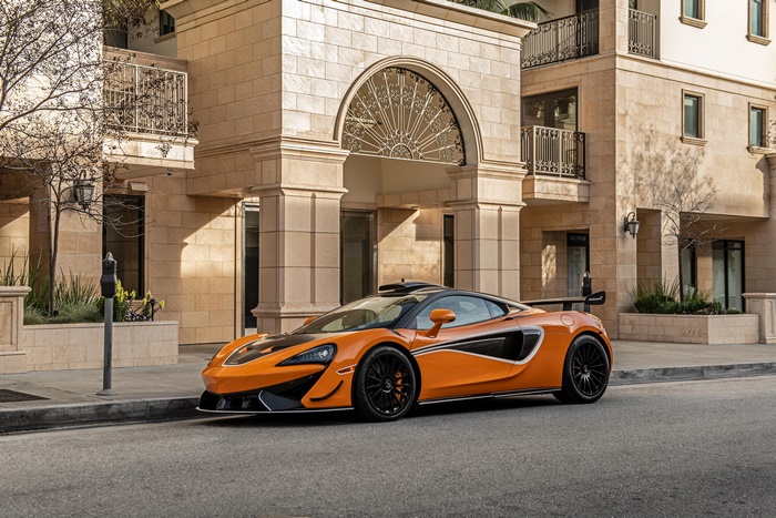 Orange McLaren 620R 4K parked on street
