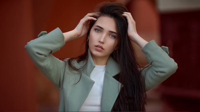 Brunette Woman with Blue Eyes and Long Hair