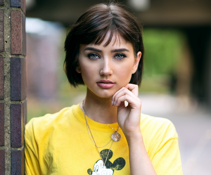 Brunette Woman with Blue Eyes and Short Hair