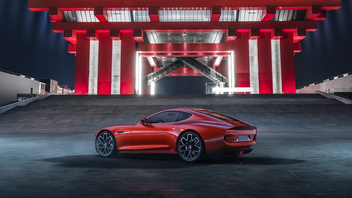Piëch Mark Zero electric car in front of red structure