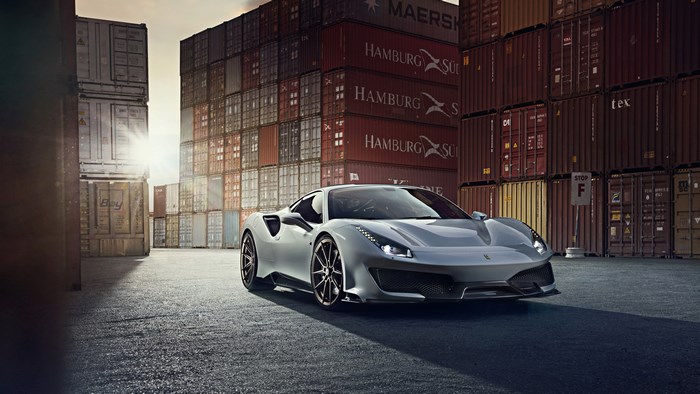 Silver Ferrari 488 in a Shipping Container Yard