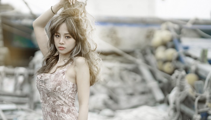 Asian woman with long wavy hair