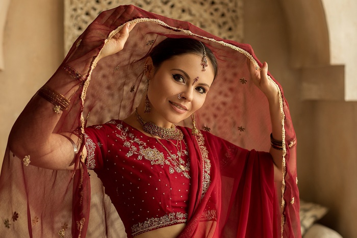 Woman in Red Saree with Veil