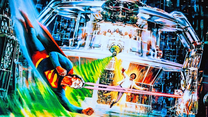 Superman using heat vision in a futuristic facility