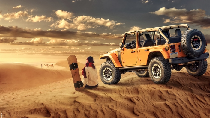 Orange Jeep Wrangler in the Desert with Sandboarder