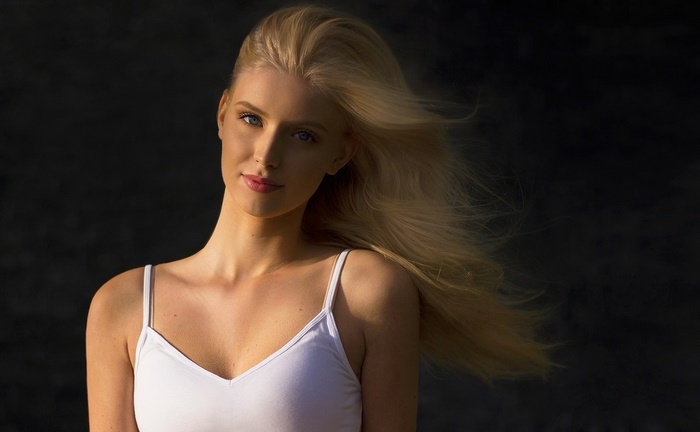 Blonde woman with windblown hair