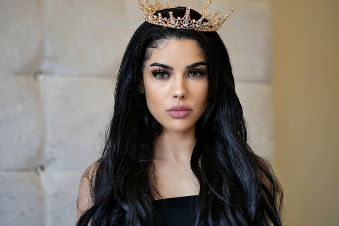 Woman with Long Black Hair and Crown