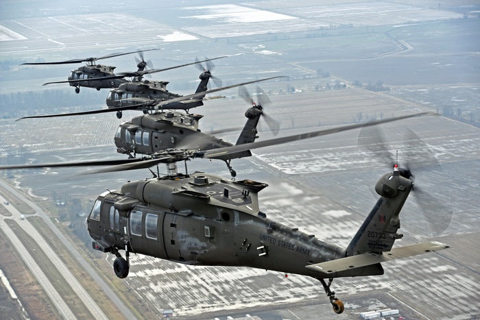 Four Sikorsky UH-60 Black Hawk helicopters in formation