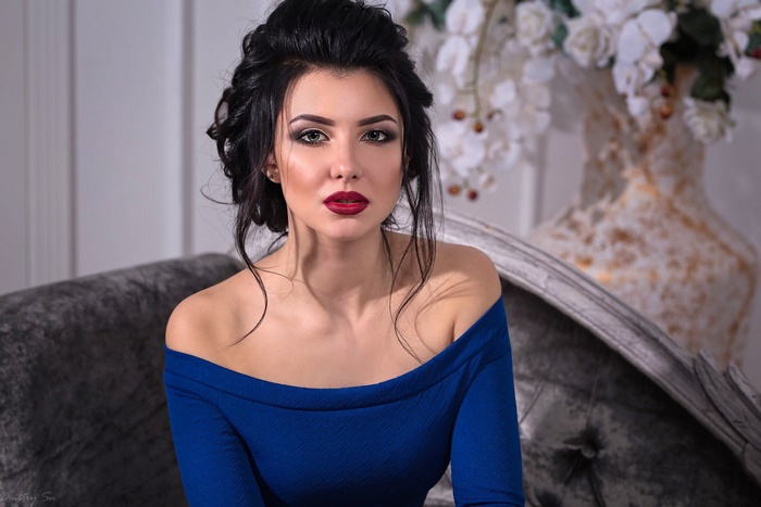 Elegant Woman with Dark Hair and Red Lipstick