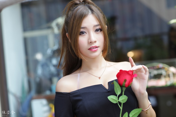 Asian Woman with Red Rose