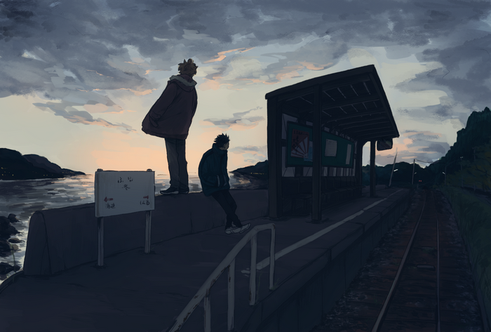 Two figures at a train station by the sea at dusk