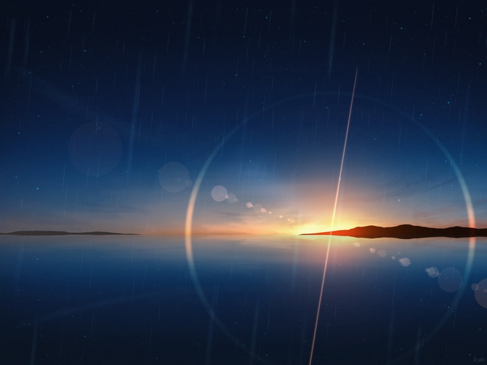 Sunset over the ocean with rain and lens flare