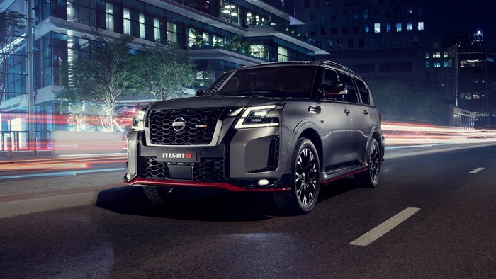 Nissan Patrol Nismo SUV on a City Street at Night