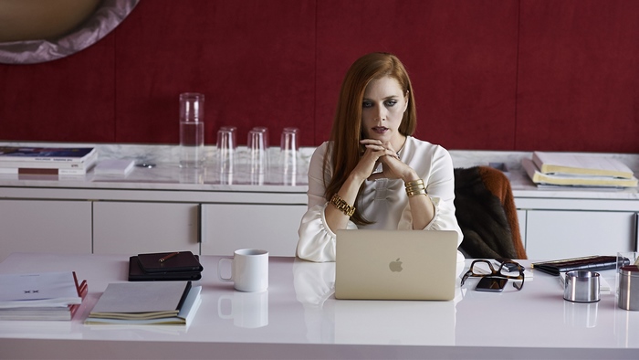 Amy Adams in an office setting