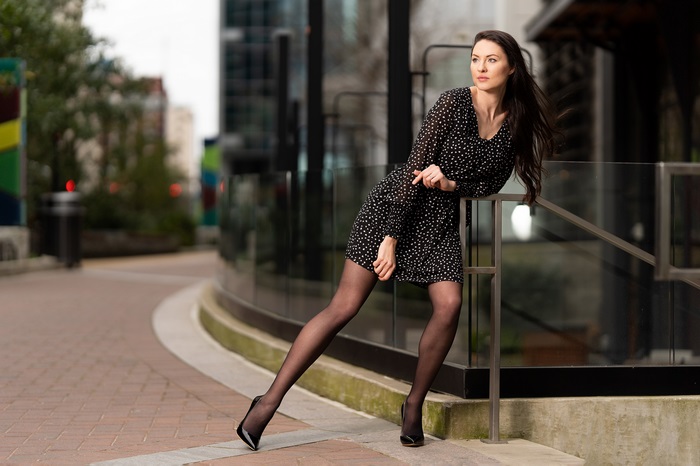 Woman in Black Dress with 4K Depth of Field