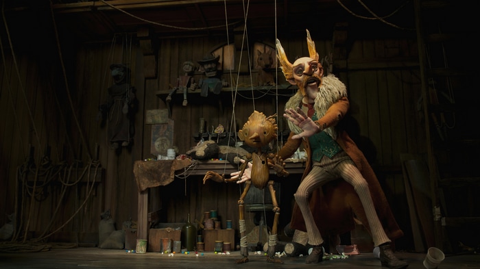 Pinocchio and Geppetto in a workshop