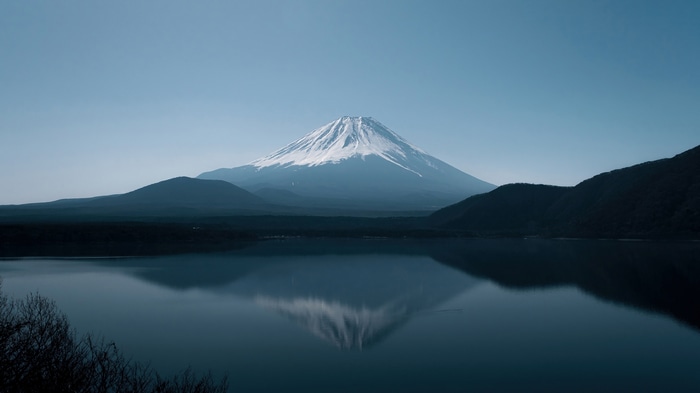 Mount Fuji reflected in a calm lake