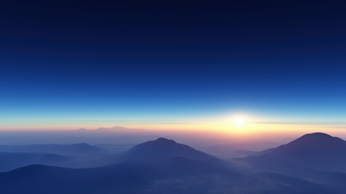 Sunrise over misty mountains 4K