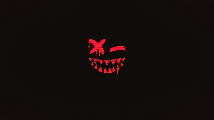 Red Grinning Mask with Sharp Teeth