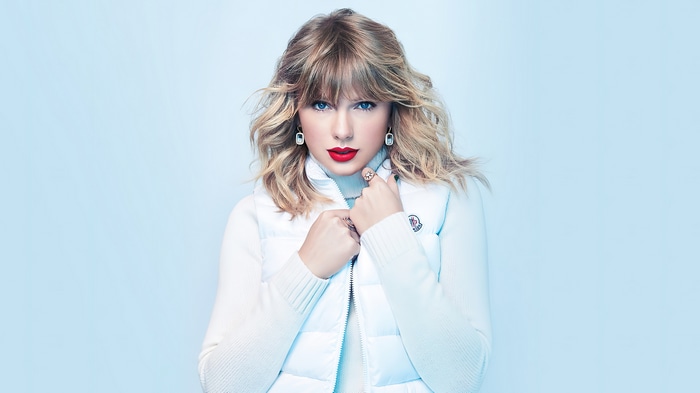 Taylor Swift in white puffer vest and sweater 4K