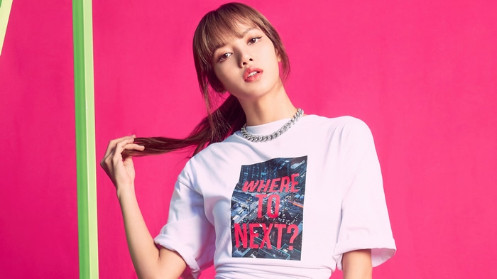 Lisa from BLACKPINK wearing a white t-shirt