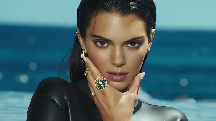 Kendall Jenner wearing jewelry in front of the ocean 4K