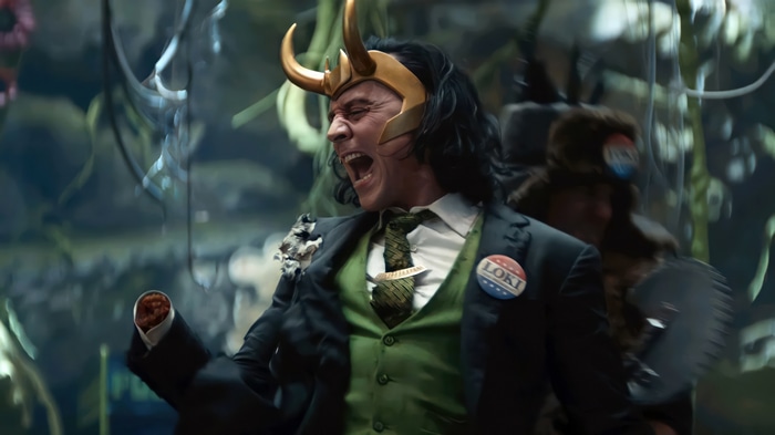 Loki in a Suit with a Loki Button