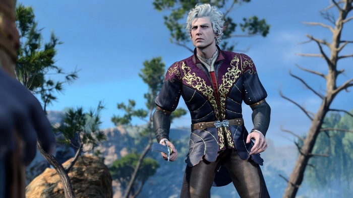 Elf character in ornate clothing holding a dagger