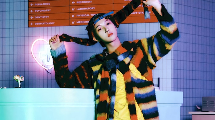 Renjun from NCT DREAM in colorful outfit
