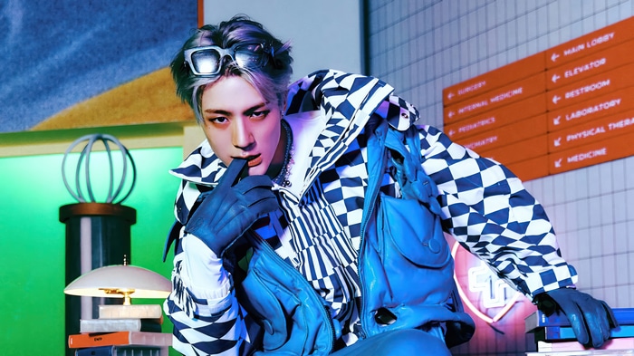 Jeno from NCT DREAM in a checkered jacket